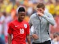 Steven Gerrard of England speaks with Raheem Sterling of England after he was shown a red card during the International friendly match between England and Ecuador at Sun Life Stadium on June 4, 2014