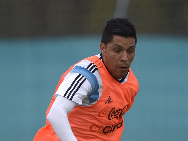 Argentina's midfielder Enzo Perez controls the ball during a training session in Ezeiza, Buenos Aires, Argentina on May 31, 2014