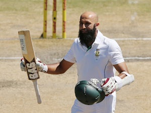 Amla century leads South Africa to 304