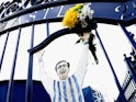 Fans pose in front of the Jeff Astle Gates before the Barclays Premier League match between West Bromwich Albion and Stoke City at The Hawthorns on May 11, 2014