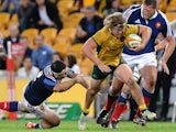 Michael Hooper of the Wallabies breaks through the defence during the First International Test Match on June 7, 2014
