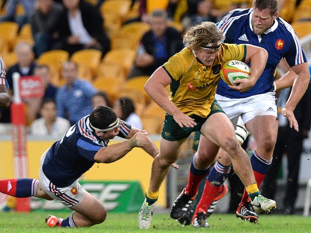 Michael Hooper of the Wallabies breaks through the defence during the First International Test Match on June 7, 2014