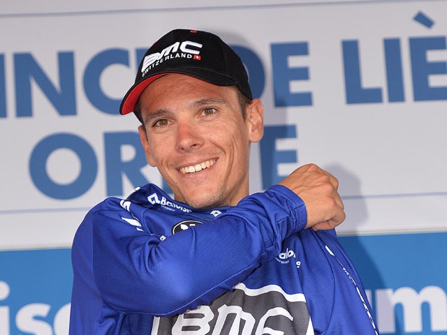 Belgian cyclist Philippe Gilbert of the BMC Racing Team celebrates on the podium after winning the points ranking after the final stage of the Baloise Belgium Tour cycling race, 178,7 km from Oreye to Oreye, on June 1, 2014