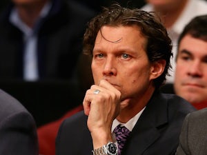 Assistant coach Quin Snyder and head coach Mike Budenholzer of the Atlanta Hawks look on in the second half against the Brooklyn Nets at the Barclays Center on January 6, 2014