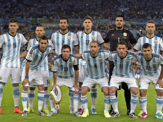 Argentina's national team players pose during the Group F football match between Argentina and Bosnia Hercegovina at the Maracana Stadium in Rio De Janeiro during the 2014 FIFA World Cup on June 15, 2014