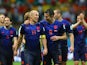 Arjen Robben (L) and Robin van Persie of the Netherlands walk off the field after scoring two goals each and defeating Spain 5-1 during the 2014 FIFA World Cup on June 13, 2014