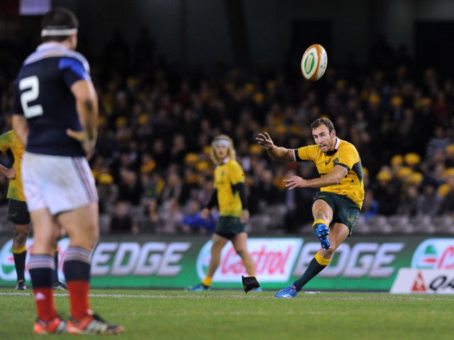 Australia's Nic White kicks a penalty goal during the second rugby union test match against France at Etihad Stadium in Melbourne on June 14, 2014