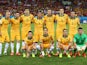 Australia line up for a team photo before the 2014 FIFA World Cup Brazil Group B match between Chile and Australia at Arena Pantanal on June 13, 2014