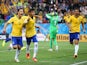 Neymar of Brazil celebrates his second goal with Hernanes in the second half during the 2014 FIFA World Cup Brazil Group A match between Brazil and Croatia at Arena de Sao Paulo on June 12, 2014