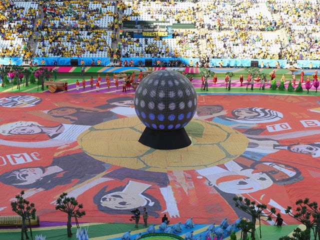The Happiness Flag is seen as artists perform during the Opening Ceremony of the 2014 FIFA World Cup Brazil prior to the Group A match between Brazil and Croatia at Arena de Sao Paulo on June 12, 2014