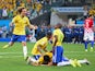 David Luiz of Brazil celebrates with teammates after a goal by Oscar in the second half during the 2014 FIFA World Cup Brazil Group A match between Brazil and Croatia at Arena de Sao Paulo on June 12, 2014