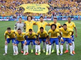 The Brazil team pose prior to the 2014 FIFA World Cup Brazil Group A match between Brazil and Croatia at Arena de Sao Paulo on June 12, 2014