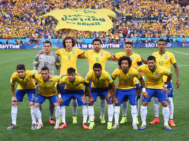 The Brazil team pose prior to the 2014 FIFA World Cup Brazil Group A match between Brazil and Croatia at Arena de Sao Paulo on June 12, 2014