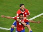  Jean Beausejour of Chile celebrates scoring his teams third goal with Mauricio Pinilla during the 2014 FIFA World Cup Brazil Group B match between Chile and Australia at Arena Pantanal on June 13, 2014