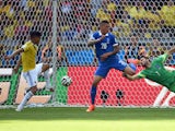 Colombia's forward Teofilo Gutierrez scores his team's second goal during a group C football match between Colombia and Greece at the Mineirao Arena in Belo Horizonte during the 2014 FIFA World Cup on June 14, 2014