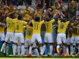 Colombia players celebrate Pablo Armero's opening goal in the World Cup Group C match against Greece on June 14, 2014