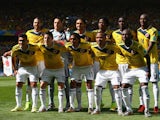  Colombia players pose for a team photo before the 2014 FIFA World Cup Brazil Group C match between Colombia and Greece at Estadio Mineirao on June 14, 2014