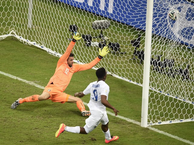 England's forward Daniel Sturridge scores during a Group D football match between England and Italy at the Amazonia Arena in Manaus during the 2014 FIFA World Cup on June 14, 2014