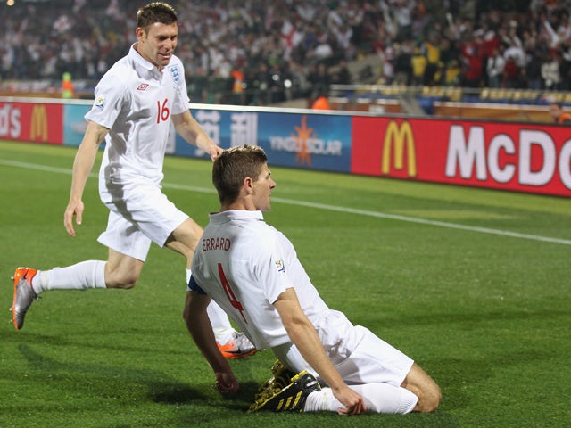 Steven Gerrard of England celebrates scoring the first goal during the 2010 FIFA World Cup South Africa Group C match between England and USA at the Royal Bafokeng Stadium on June 12, 2010