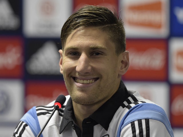 Argentina's defender Federico Fernandez addresses a press conference after a training session at 'Cidade do Galo', their base camp in Vespasiano, near Belo Horizonte, some 470 Km north of Rio de Janeiro, Brazil on June 13, 2014 
