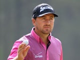 Graeme McDowell of Northern Ireland waves to the gallery during the first round of the 114th U.S. Open at Pinehurst Resort & Country Club, Course No. 2 on June 12, 2014