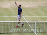 Grigor Dimitrov of Bulgaria celebrates defeating Stan Wawrinka of Switzerland during their Men's Singles semi-final match on day six of the Aegon Championships at Queens Club on June 14, 2014