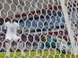 Honduras' goalkeeper and captain Noel Valladares handles the ball to score an own goal from a shot by France's Karim Benzema during a Group E football match between France and Honduras at the Beira-Rio Stadium in Porto Alegre during the 2014 FIFA World Cu