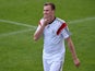 Germany's defender Kevin Grosskreutz reacts during a training game of the German national football team and the under 20 German national team at the training ground in San Martino in Passiria, Italy, on May 25, 2014
