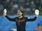 Mexico's goalkeeper Guillermo Ochoa gestures during a Group A football match between Mexico and Cameroon at the Dunas Arena in Natal during the 2014 FIFA World Cup on June 13, 2014