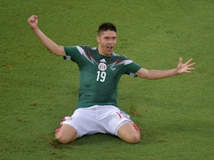 Mexico close in on last 16
