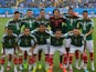 Mexico's national football team players pose for a picture before the Group A football match between Mexico and Cameroon at the Dunas Arena in Natal during the 2014 FIFA World Cup on June 13, 2014