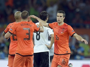 Dutch forward Robin van Persie celebrates after scoring a goal during the Euro 2012 championships football match the Netherlands vs Germany on June 13, 2012