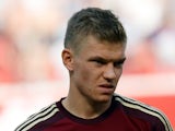Russia's mildfielder Oleg Shatov listens to the national anthems, before the start of the friendly football match between Russia and Morocco, in Moscow, on June 6, 2014