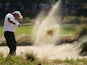 Phil Mickelson of the United States hits a shot from a bunker during a practice round prior to the start of the 114th U.S. Open at Pinehurst Resort & Country Club on June 10, 2014
