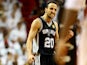 Manu Ginobili #20 of the San Antonio Spurs celebrates against the Miami Heat during Game Four of the 2014 NBA Finals at American Airlines Arena on June 12, 2014