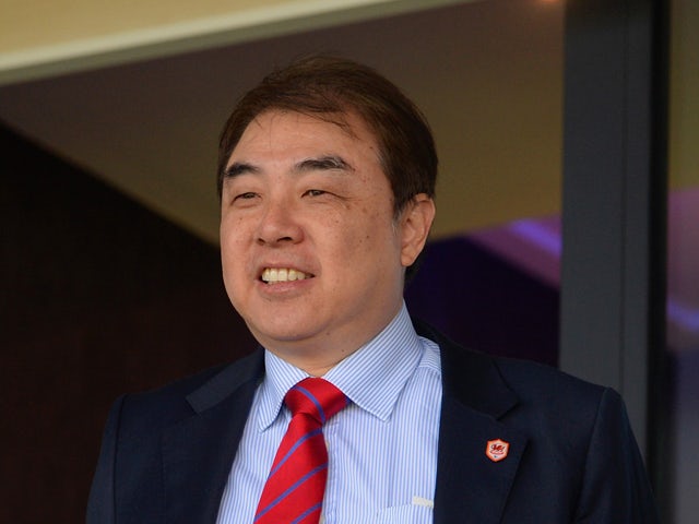 Cardiff City Football Club's Chief Executive Simon Lim looks on during the Barclays Premier League match between West Bromwich Albion and Cardiff City at The Hawthorns on March 29, 2014 