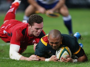 Cornal Hendricks of South Africa over for a try during the Incoming Tour match between South Africa and Wales at Growthpoint Kings Park on June 14, 2014 
