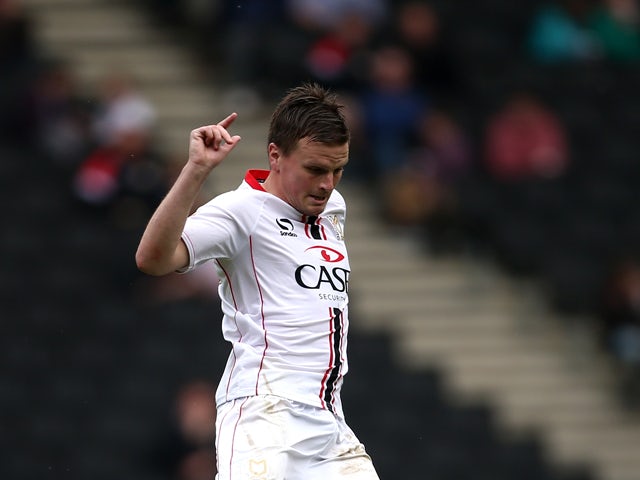 Stephen Gleeson of MK Dons in action during the Sky Bet League One match between MK Dons and Brentford at Stadium mk on April 21, 2014