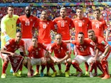 Members of the Swiss national team pose prior to a Group E football match between Switzerland and Ecuador at the Mane Garrincha National Stadium in Brasilia during the 2014 FIFA World Cup on June 15, 2014