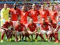 Members of the Swiss national team pose prior to a Group E football match between Switzerland and Ecuador at the Mane Garrincha National Stadium in Brasilia during the 2014 FIFA World Cup on June 15, 2014