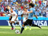  Edinson Cavani of Uruguay shoots and scores his team's first goal on a penalty kick during the 2014 FIFA World Cup Brazil Group D match between Uruguay and Costa Rica at Castelao on June 14, 2014 