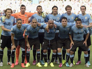 Players of Uruguay pose for a team picture prior to a Group D football match between Uruguay and Costa Rica at the Castelao Stadium in Fortaleza during the 2014 FIFA World Cup on June 14, 2014