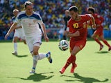Russia's defender Aleksei Kozlov and Belgium's midfielder Eden Hazard vie for the ball during a Group H football match on June 22, 2014