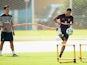 Alex Oxlade-Chamberlain runs drills during an England training session on June 16, 2014.