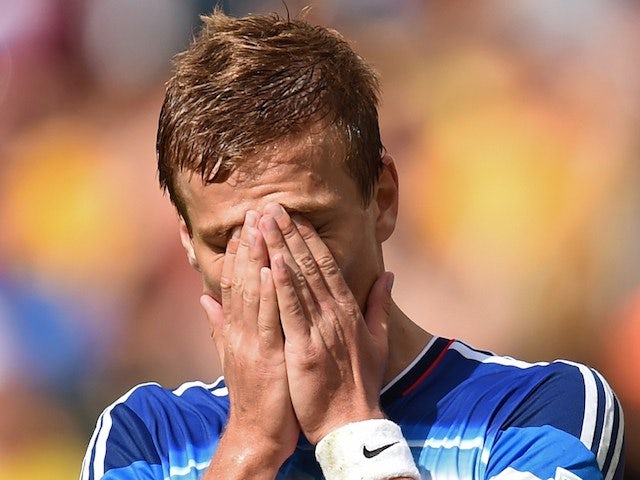 Russia's forward Alexander Kokorin reacts after missing a shot during a Group H football match against Belgium on June 22, 2014