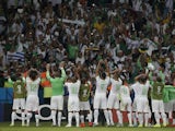 Algeria's players celebrate after the Group H football match between South Korea and Algeria at the Beira-Rio Stadium in Porto Alegre during the 2014 FIFA World Cup on June 22, 2014