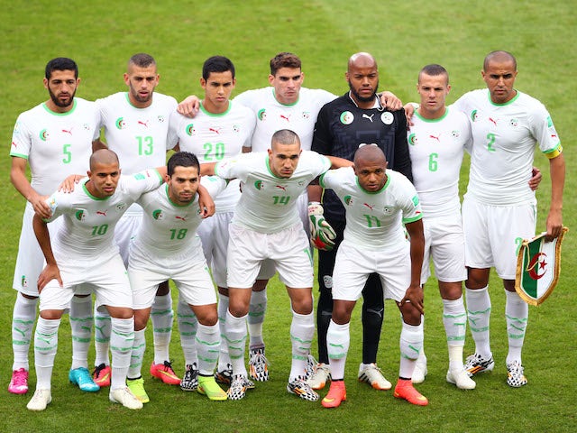 Algeria players pose for a team photo prior to the 2014 FIFA World Cup Brazil Group H match between South Korea and Algeria at Estadio Beira-Rio on June 22, 2014