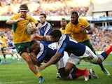 Nick Cummins of the Wallabies is tackled during the International Test match between the Australia Wallabies and France at Allianz Stadium on June 21, 2014