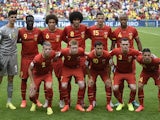 Belgium's footballers pose for pictures before the Group H football match between Belgium and Russia at the Maracana Stadium in Rio de Janeiro during the 2014 FIFA World Cup on June 22, 2014