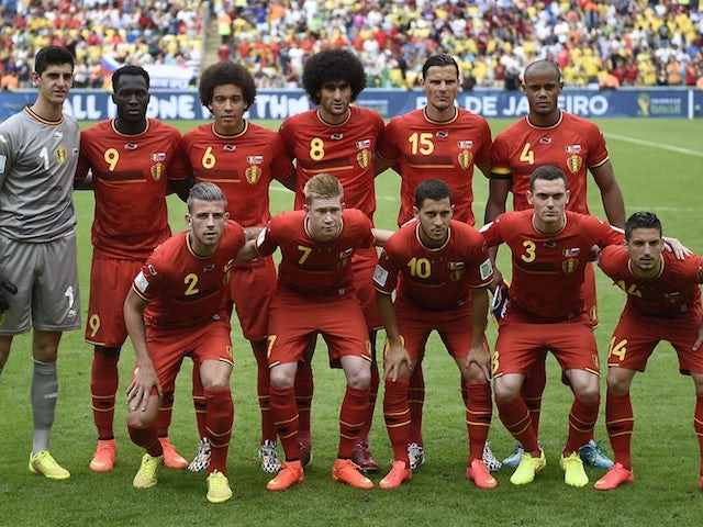 Belgium's footballers pose for pictures before the Group H football match between Belgium and Russia at the Maracana Stadium in Rio de Janeiro during the 2014 FIFA World Cup on June 22, 2014